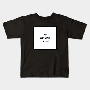 I am winning in life Kids T-Shirt